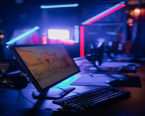 Modern gaming setup colorful lighting technology digital entertainment neon